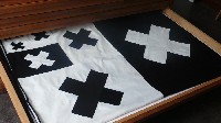 Thomas I'Anson, ‘SOME CROSSES - RAISE / LOWER / INTER - (FUCK / FUCK / FUCK). All we ever wanted was self-control, all we ever got was what you dropped’, 2012. Folded black and white cotton canvas flag, 200 x 280 cm. Hand made presentation box with embossed lettering, signed, 25 x 35 cm. Edition of 3 (number embossed on the base of each box).
PHŒBUS•Rotterdam